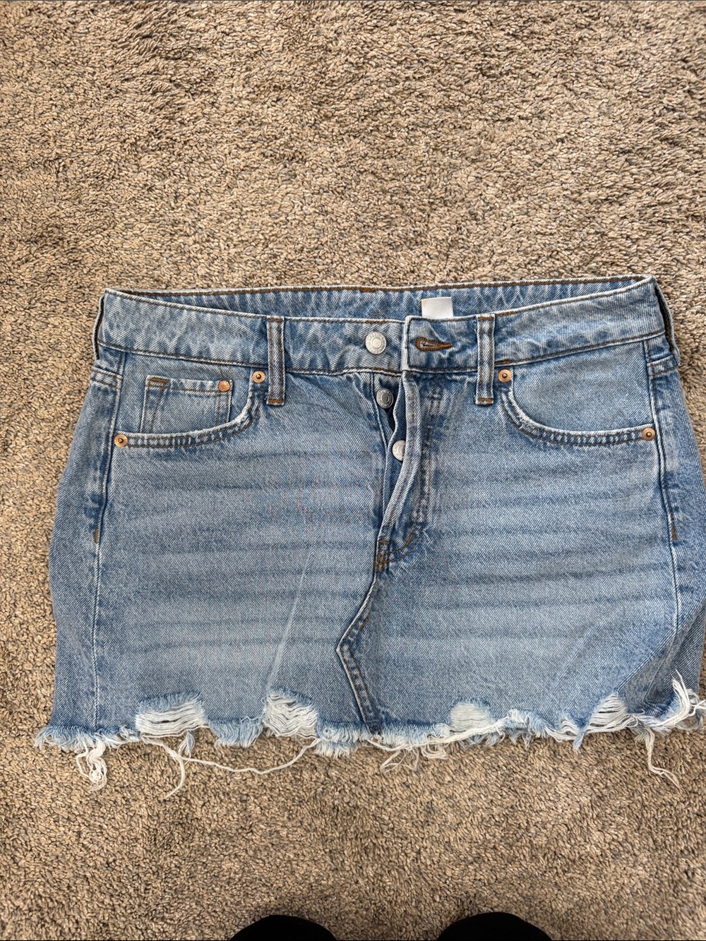Casual Light Blue Denim Mini Skirt with Distressed Hem